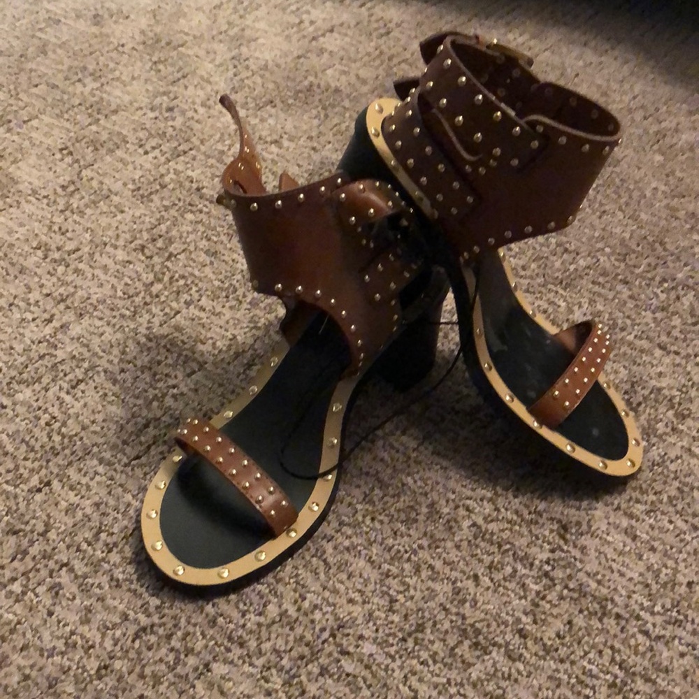 Studded sandals//tags on them